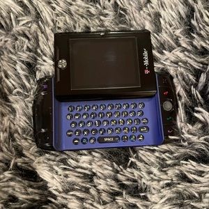 T-Mobile Sidekick Slide in color blue, works, no charger included